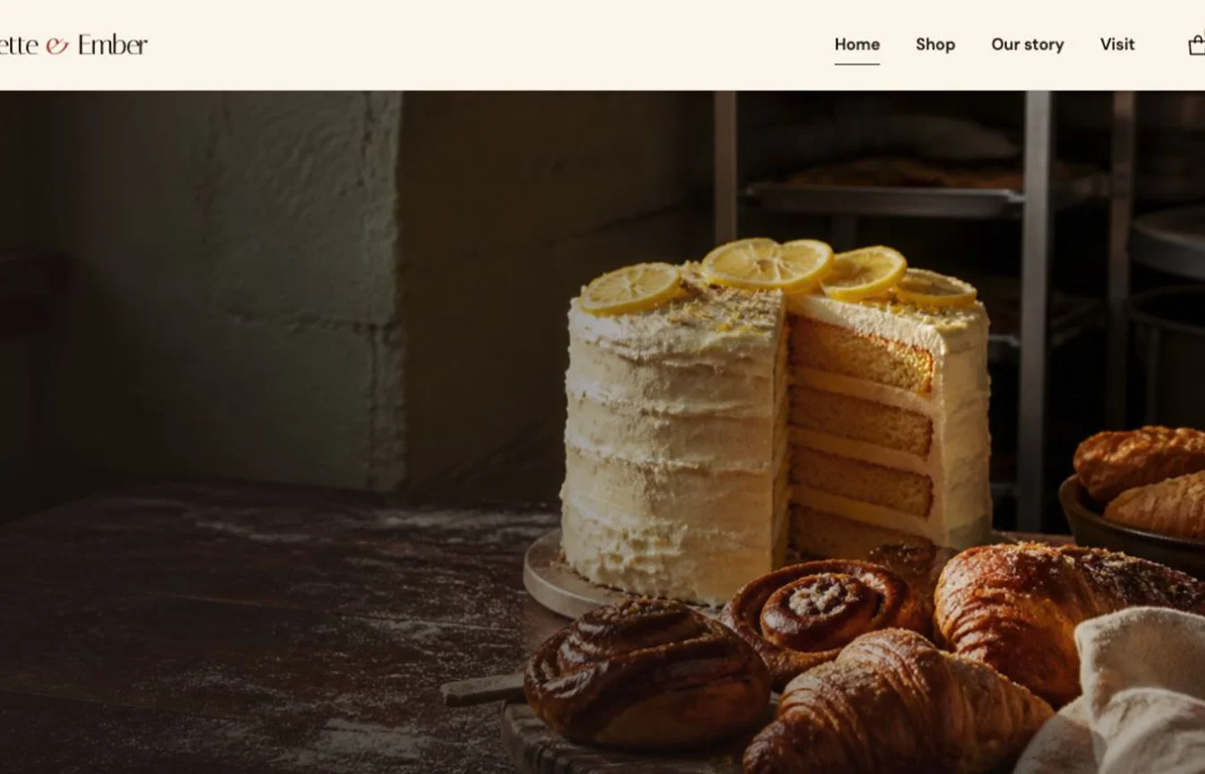 Miette & Ember bakery homepage with a lemon layer cake, pastries, and an editorial storefront hero.